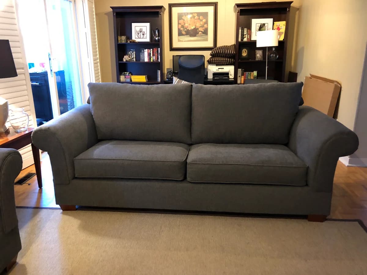 sofa upholstered with blue microfibre