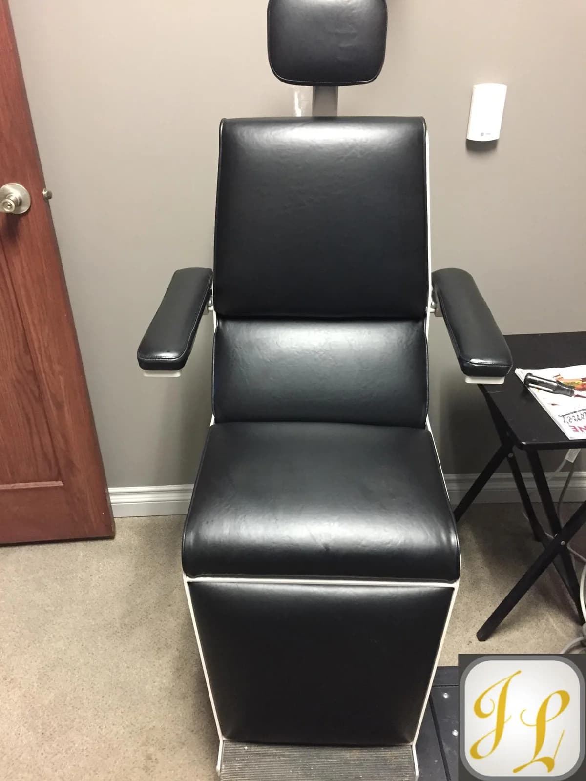 exam table upholstered with durable black vinyl